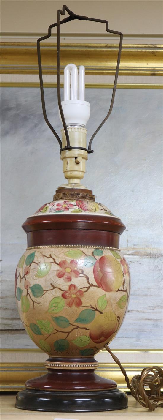 A Victorian floral and fruit painted pottery table lamp
